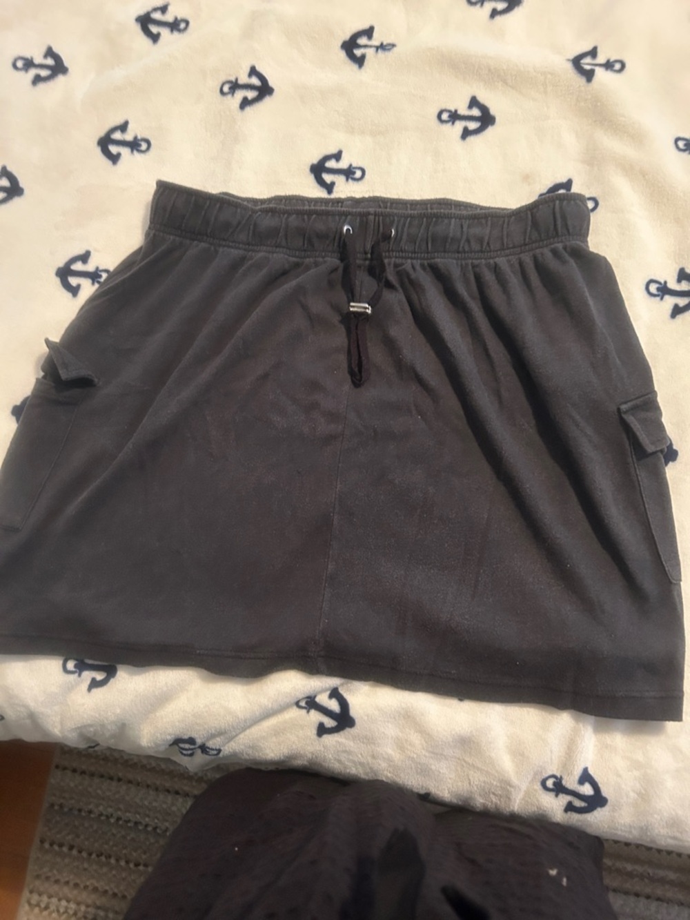 Woman Within Black Mini Skirt with Drawstring